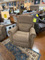 A brown La-Z-Boy Dutton Recliner 828-10-D2128-75 with classic rolled arms and brass nailhead trim.