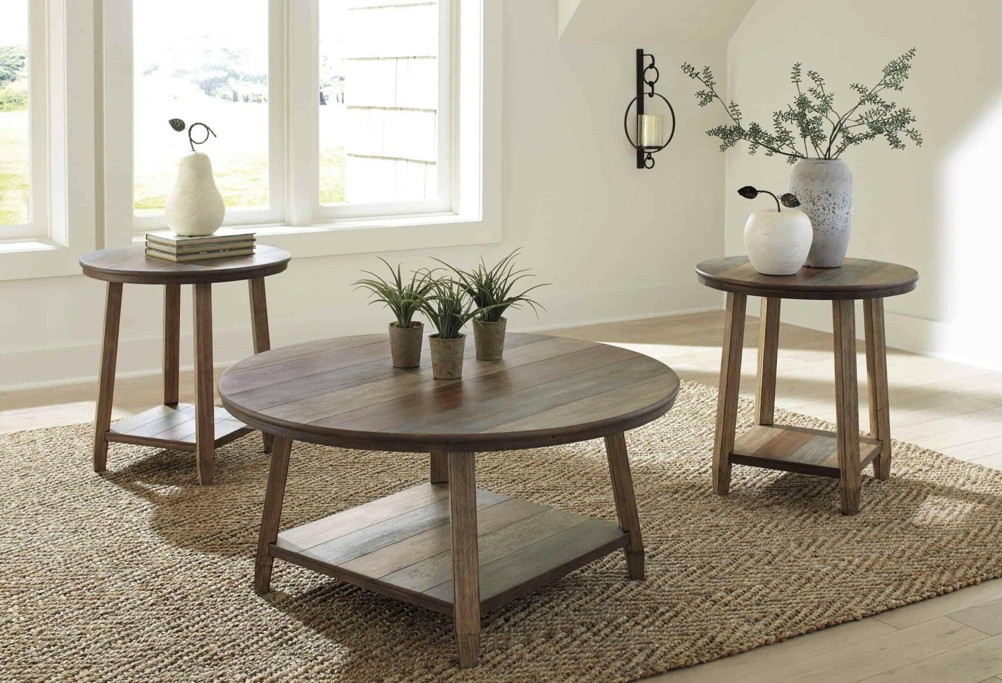 Raebecki Coffee & 2 End Tables T221-13. Raebecki Coffee & 2 End Tables T221-13.