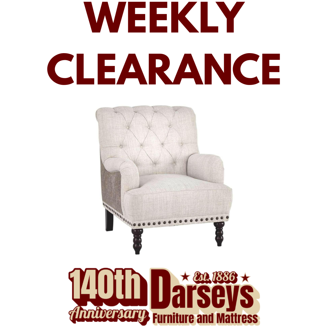 Gray upholstered armchair with 'Weekly Clearance' text and Darseys logo on a white background