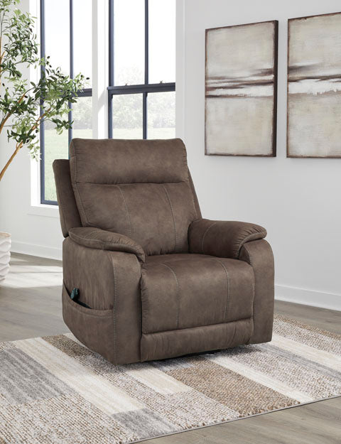 Brown faux leather Crestmeade Espresso Lift Chair 1350412 power lift recliner with a side-mounted remote control.