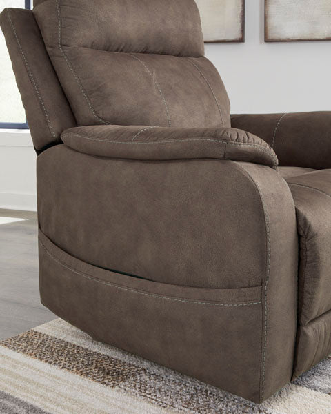 Crestmeade Espresso Lift Chair 1350412 brown faux leather power lift recliner with contrast stitching.