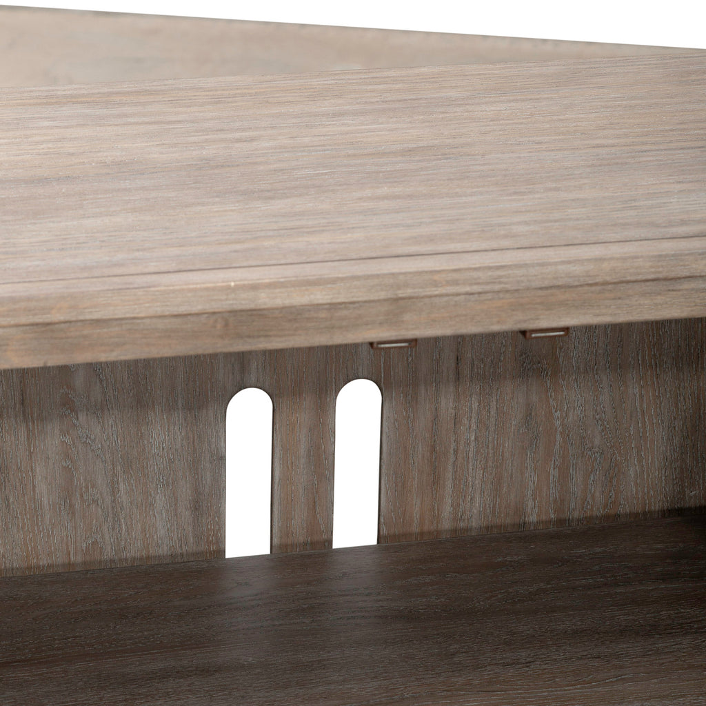 Close-up of the back panel of a wooden shelf or TV stand from Liberty Furniture, featuring two vertical oval cable management holes—a practical storage solution perfect for organizing your Lafayette Curio Cabinet 2219-AC1000 or accent cabinet.