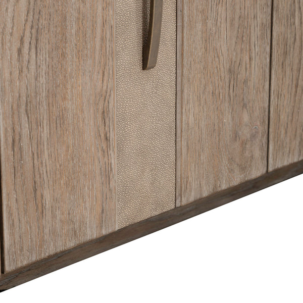 Close-up of the Lafayette Curio Cabinet 2219-AC1000 by Liberty Furniture—an elegant accent cabinet showcasing vertical wooden panels, a central textured strip, a metallic handle, and a dark wooden base against a white background—making it an ideal storage solution for any space.