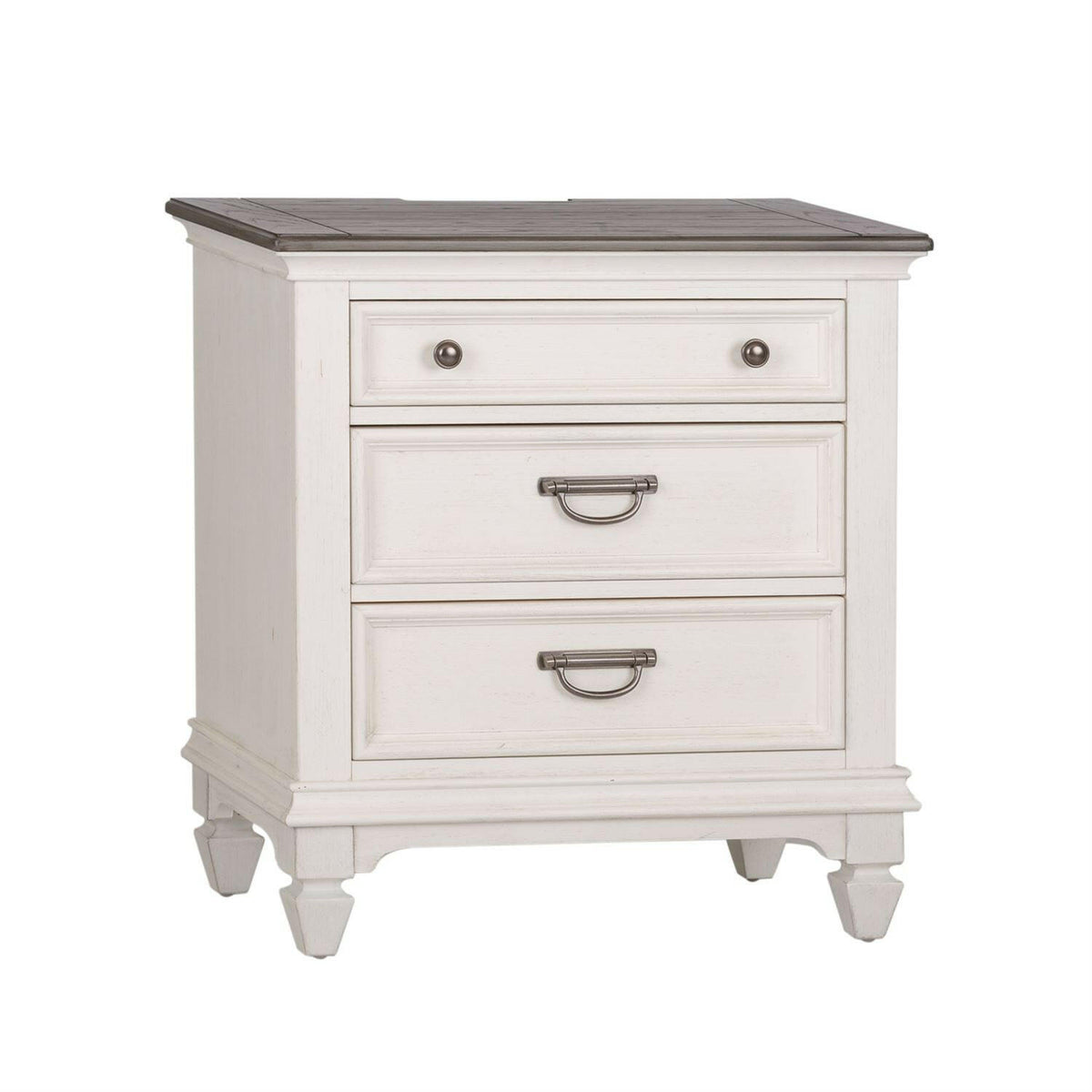 White wooden nightstand with three drawers; the top drawer has a small round knob, and the two lower drawers have metal handles. The nightstand stands on four short, tapered legs.