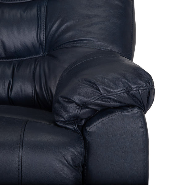 Close-up of the armrest and part of the backrest of a Franklin Furniture Corp. Trilogy Frederica Navy Recliner 4595-LM98-43, showcasing visible stitching and a plush, padded surface for enhanced comfort.
