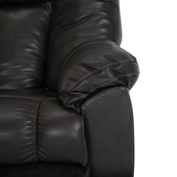 Close-up of the Connery Blaze Slate Recliner 4703-LM99-03 by Franklin Furniture Corp., highlighting the padded armrest and detailed stitching. The dark brown leather upholstery features a soft, textured surface with gentle creasing, suggesting a comfortable, plush seating experience enhanced by a gel-blended foam cushion.