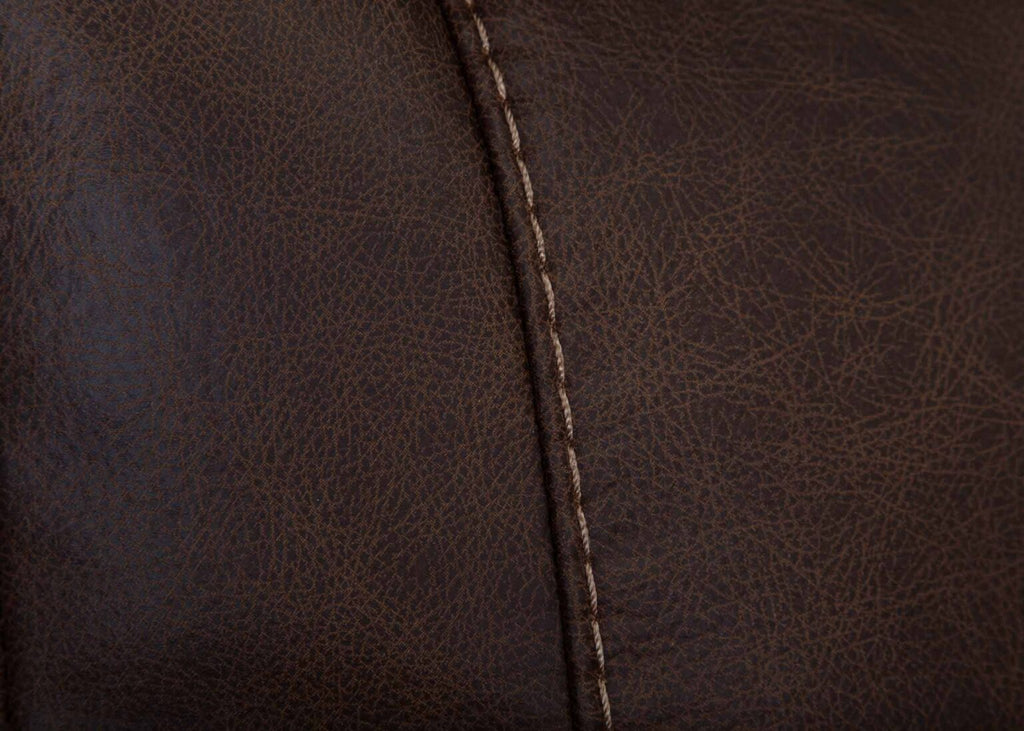 Close-up of dark brown leather with visible grain texture and a single line of beige stitching running vertically through the center, exemplifying the premium craftsmanship found in Franklin Furniture Corp.’s Phoenix Seattle Auburn Sectional 693-31-56-99-7511-18.