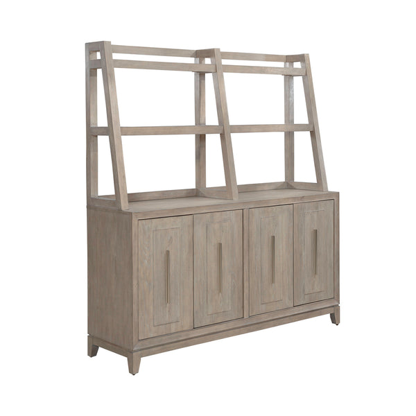 The Liberty Furniture Brentwood Sideboard 789-SB6836-SH6838 is a light wood piece featuring four cabinet doors with vertical metal handles and an open, three-tiered shelving unit on top.