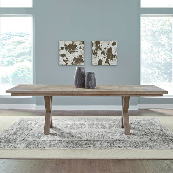 A Liberty Furniture Brentwood Table and 6 Chairs 789-C6501S-P4402-T4402 double pedestal dining table with an X-frame base and two dark vases on top, centered on a patterned area rug.