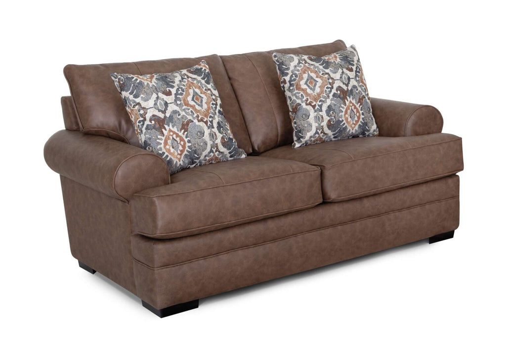 The Langston Duvall Vintage Brown Loveseat (83220-3429-16) by Franklin Furniture Corp. features rich brown leather upholstery from the Langston Collection, rolled arms, and includes two patterned throw pillows. Set against a white background, this loveseat combines modern and classic design elements with cushioned seats and backrest, all enhanced by the comfort of the WOW Seating System.