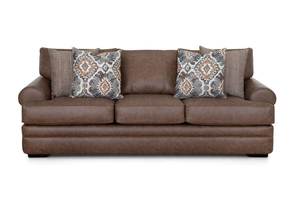 The Franklin Furniture Corp. Langston Duvall Vintage Brown Sofa (83240-3429-16), part of the Langston Collection and featuring the WOW Seating System, presents three seat cushions and four decorative pillows—two with geometric patterns and two in a solid, textured fabric—set against a white background.