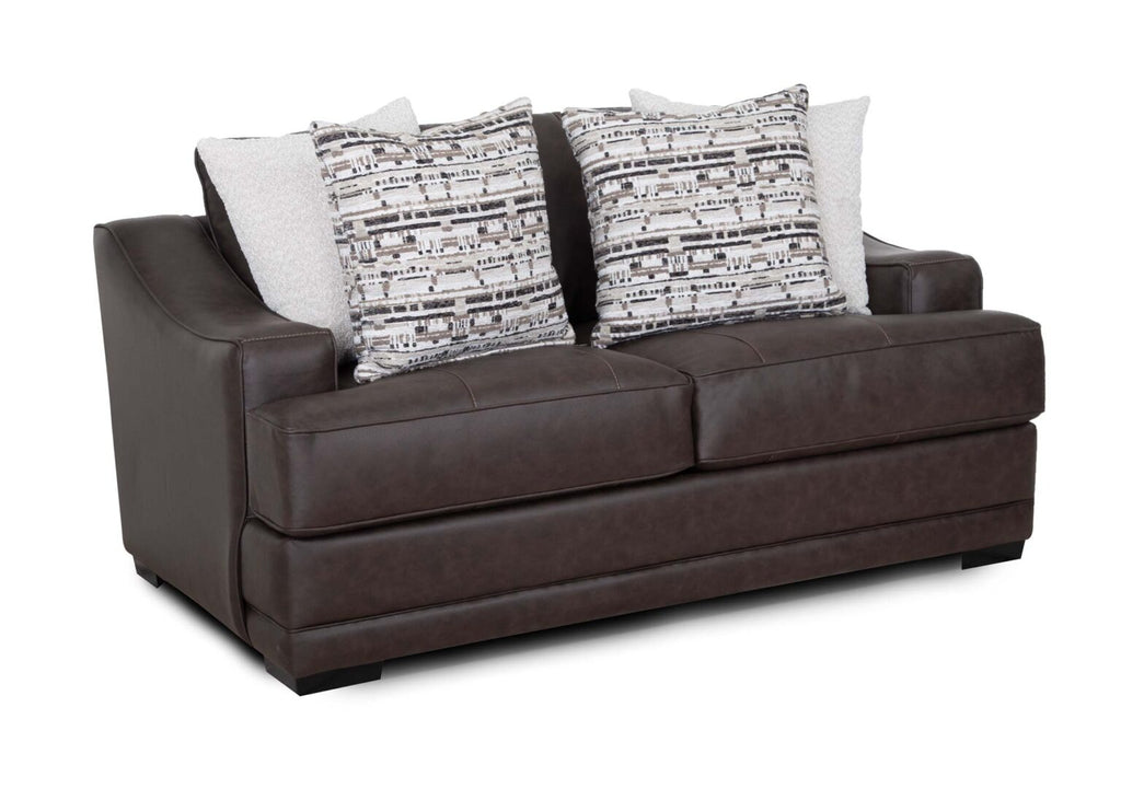 The Franklin Furniture Corp. Prescott Duvall Coffee Loveseat 89340-3429-10 is a dark brown loveseat featuring two seat cushions and four generously sized throw pillows—two with a geometric pattern and two in solid light tones—displayed on a white background. Enjoy enhanced comfort with the WOW Seating System in this premium chocolate fabric loveseat.
