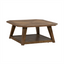 The Carolina Park Cocktail Table 930-OT1010 by Liberty Furniture showcases a square wood veneer design with angled legs and a lower shelf, highlighted by its natural brown finish and geometric pattern on the tabletop. Blending timeless style with modern flair, this coffee table makes an ideal accent for any living space.