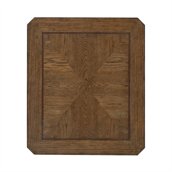The Liberty Furniture Carolina Park End Table 930-OT1020 features a rectangular white oak top with beveled corners and a geometric, symmetrical wood grain pattern at its center.