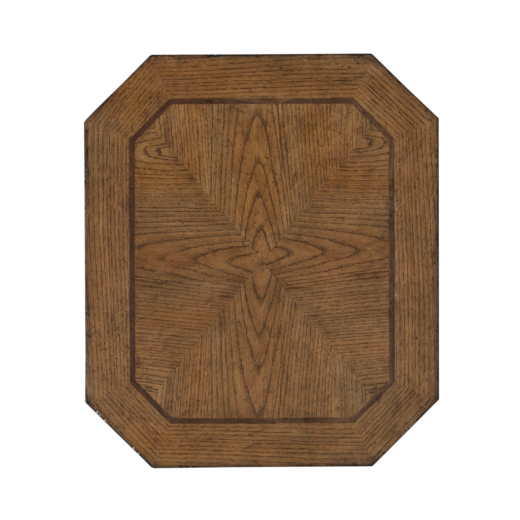 The Liberty Furniture Carolina Park End Table (930-OT1021) features a rectangular wooden tabletop with beveled corners, showcasing a symmetrical white oak veneer grain pattern accented by a darker border around the edge, all set against a white background.