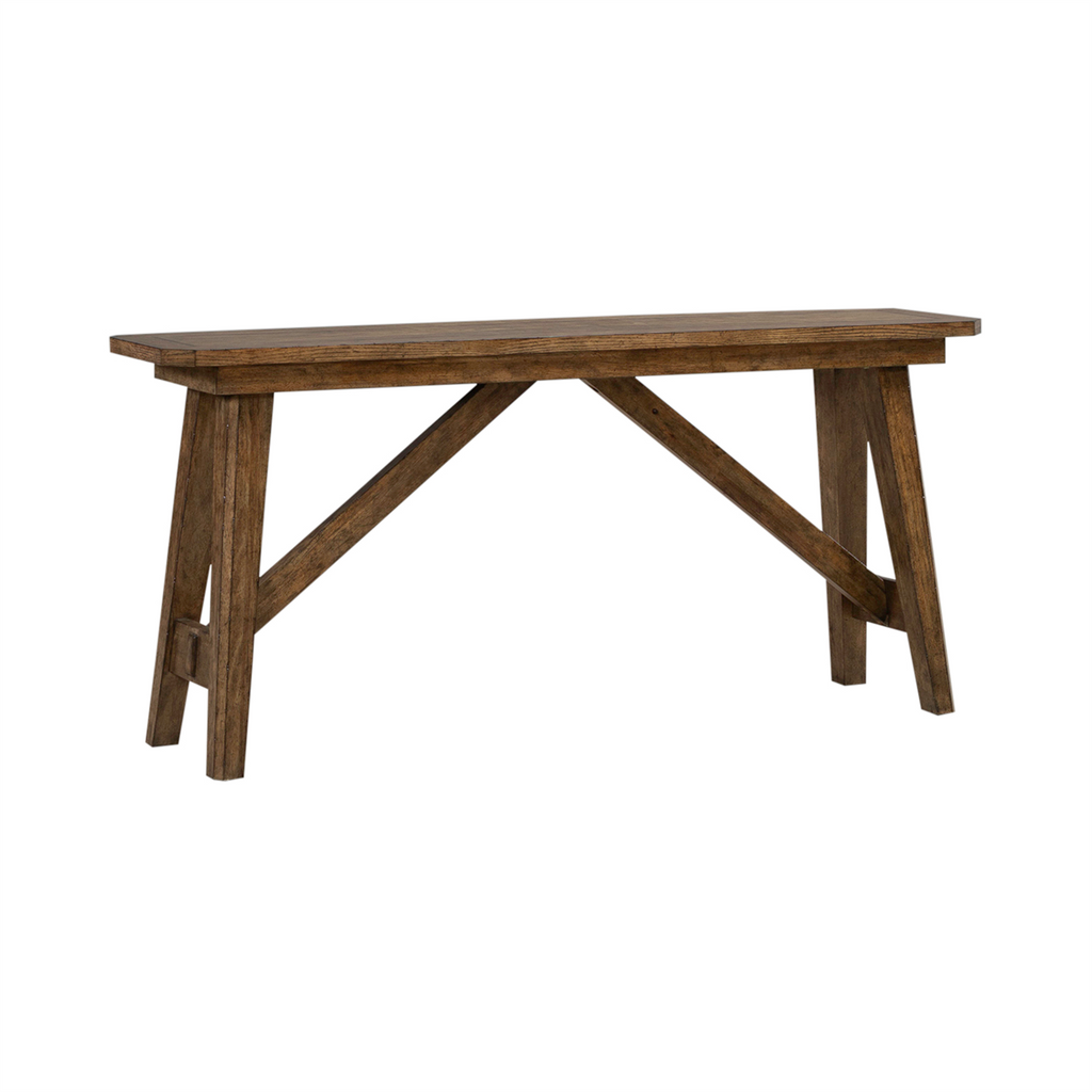 The Liberty Furniture Carolina Park Sofa Table 930-OT1030 features a rectangular top, angled legs, and crossbar supports, crafted from white oak veneers with a rustic Amber Brown finish.
