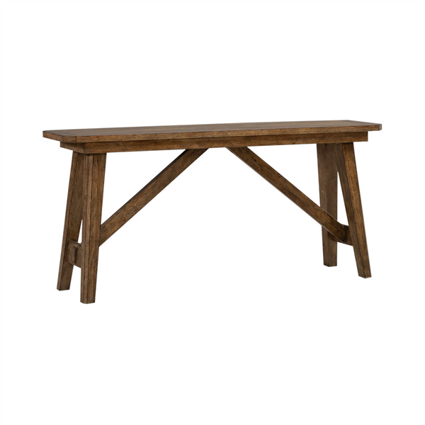 The Liberty Furniture Carolina Park Sofa Table 930-OT1030 features a rectangular top, angled legs, and crossbar supports, crafted from white oak veneers with a rustic Amber Brown finish.