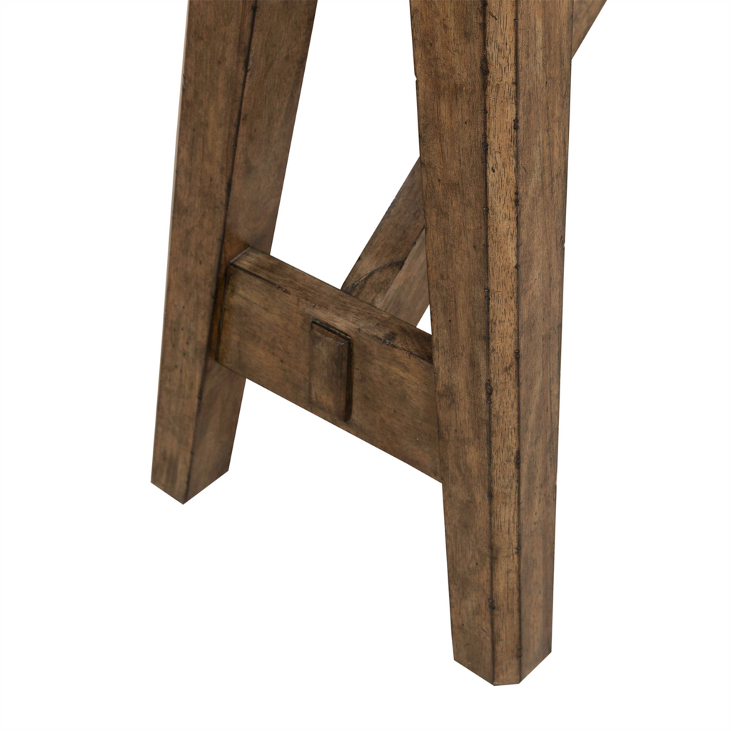 Close-up of the lower legs and footrest of a wooden stool or chair, highlighting the natural wood grain and rectangular support bar between the legs, beautifully finished in the Amber Brown tone inspired by Liberty Furniture’s Carolina Park Sofa Table 930-OT1030.