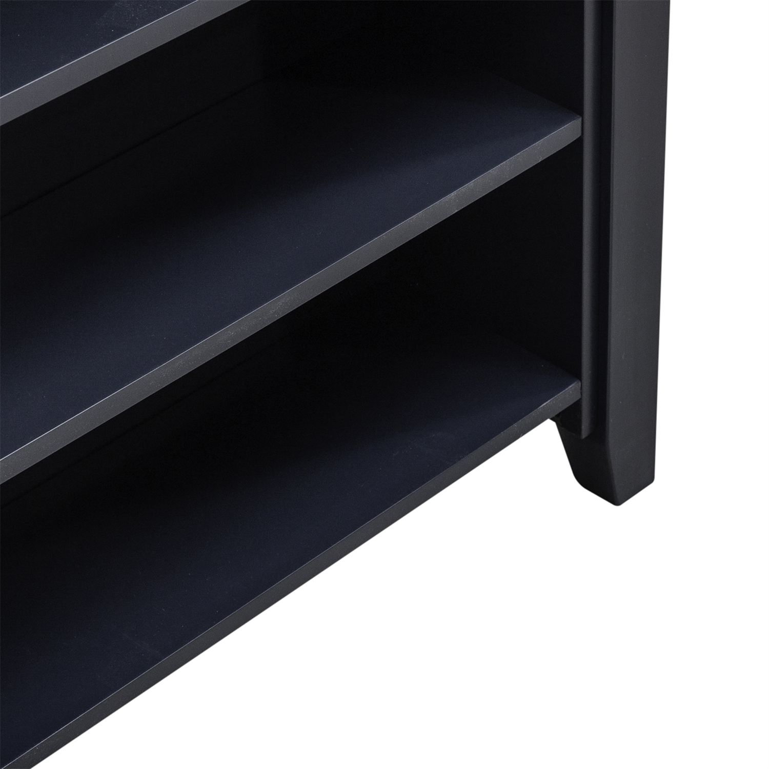 Close-up of the lower section of a dark-colored wooden shelf unit with two visible shelves and a sturdy leg on the right side, ideal for enhancing a small dining area or coordinating with the Liberty Furniture Brook Creek Table and 2 Chairs 942NY-CD-3CTS in navy blue.