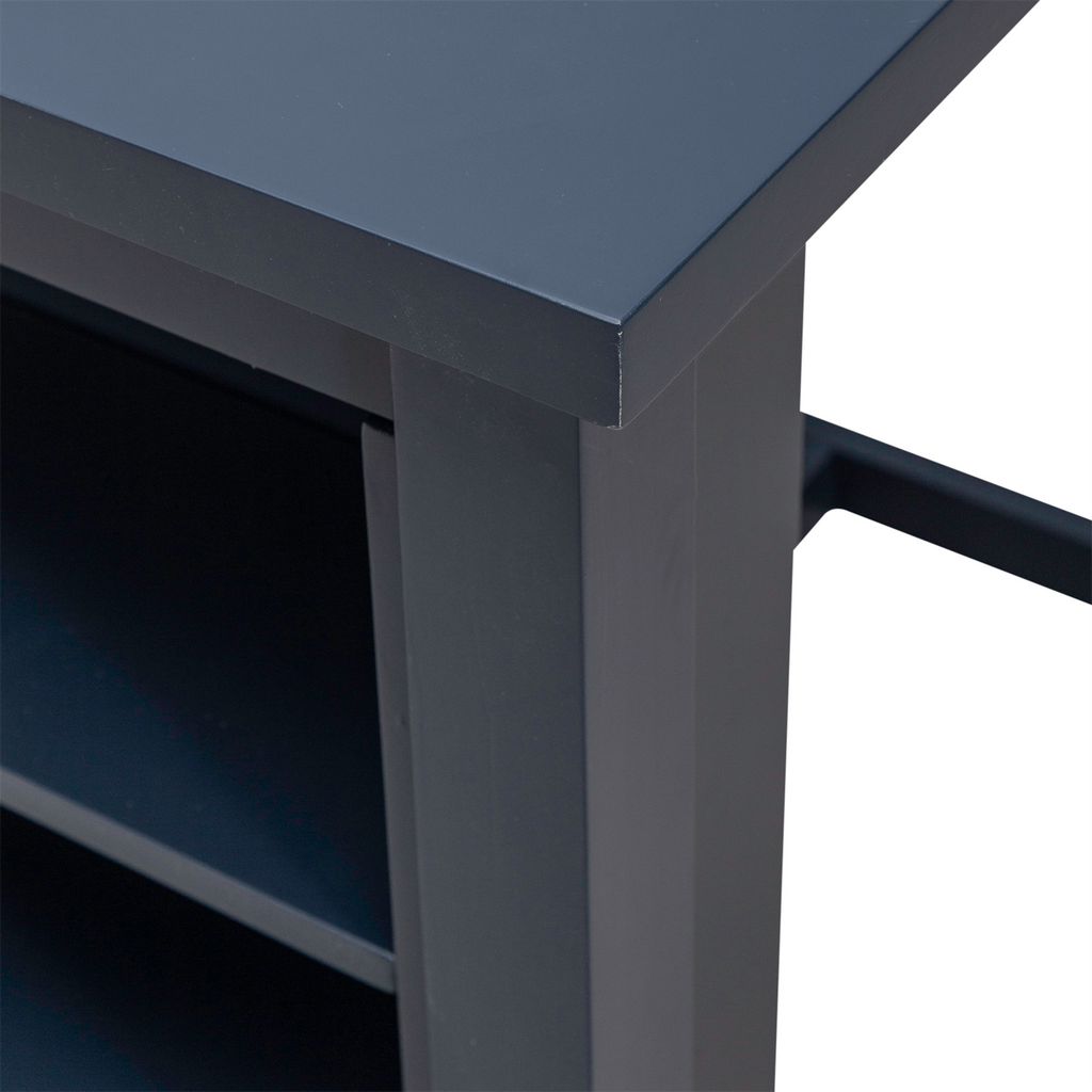Close-up of the corner of the Brook Creek Table and 2 Chairs 942NY-CD-3CTS by Liberty Furniture, featuring shelves underneath, clean lines, and a modern design set against a white background—ideal for small space dining.
