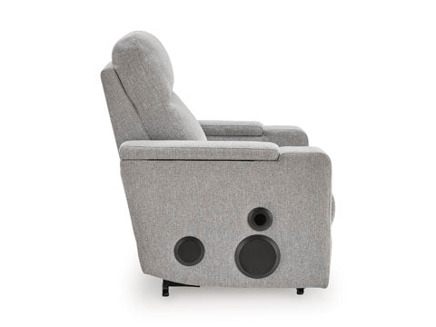 Side view of a light gray Pineland Pewter Power Recliner 9930642A upholstered home theater power recliner with two circular speakers integrated into the base.