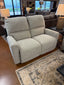 Light gray textured La-Z-Boy Cade Reclining Loveseat 803-448-D2068-71 with two plush seats and cushioned headrests.