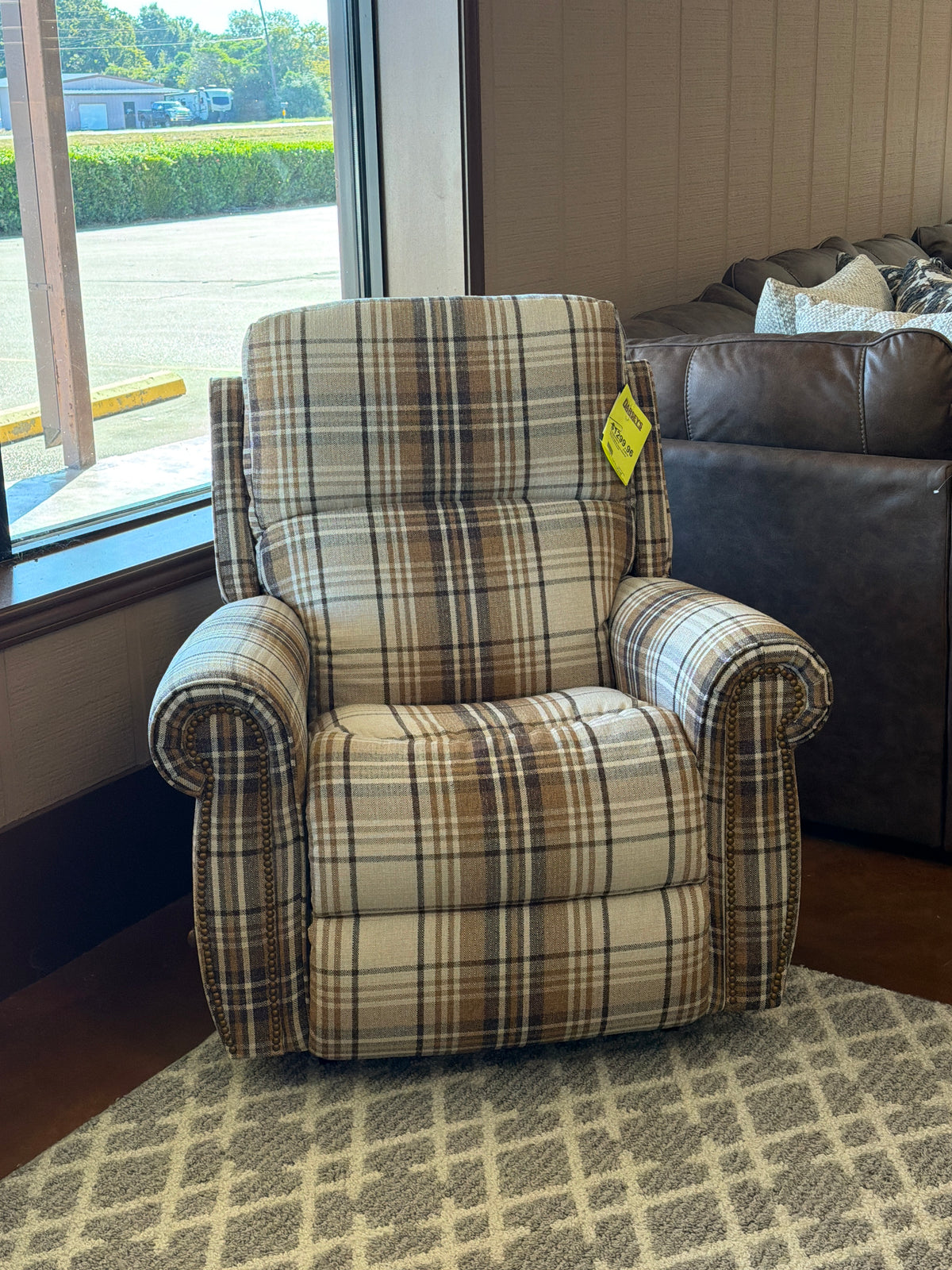 A La-Z-Boy Dutton Recliner 828-10-D1988-49 in a plaid pattern featuring rolled arms and nailhead trim.