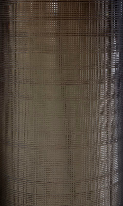 Ashley Dingerly Lamp L430824 featuring a cylindrical base with a dark, grid-patterned textured surface.