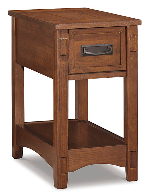 Breegin Brown Chairside End Table T007-319, a brown wooden Mission-style chairside end table with a single drawer featuring a dark metal handle and an open bottom shelf.
