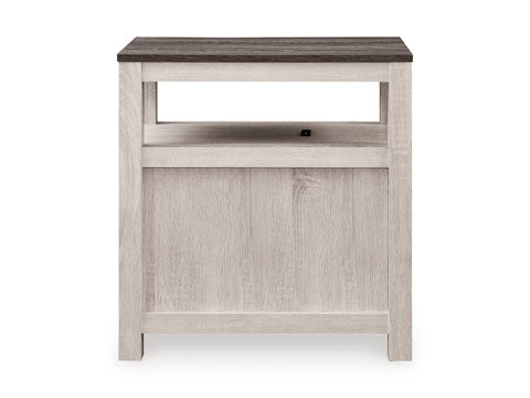 The Fendenmore White Chairside End Table T190-217 is a two-tone end table featuring a dark rectangular top, a single open shelf, and a light-colored wooden base with a solid front panel.