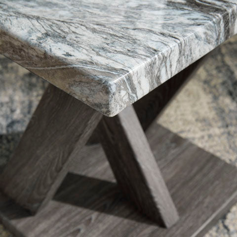 Close-up of a Bensonale Cocktail Table and 2 End Tables T400-13, featuring a contemporary cocktail table with a faux gray marble top and an X-shaped wooden base.