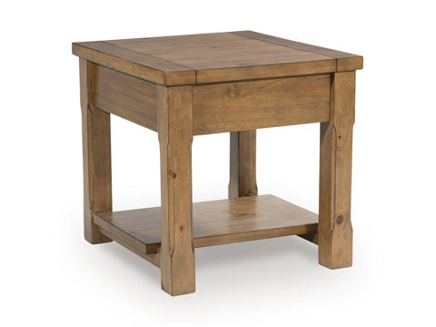 The Ashley Vandenmore End Table T539-3 boasts a farmhouse-inspired design with a square top, lower shelf, natural wood finish, and sturdy legs—making it the perfect stylish storage solution beside your sofa.