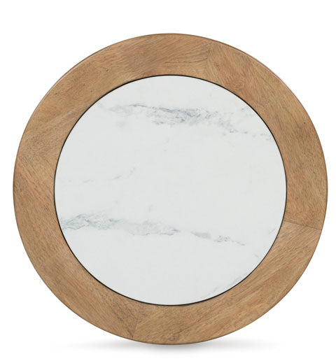 Featuring a simple and modern design, the Camdill End Table T808-6 by Ashley showcases a round silhouette with a wide, light brown wooden border surrounding a white faux Carrara marble center accented with subtle gray veining—making it the perfect accent piece for a contemporary living room.