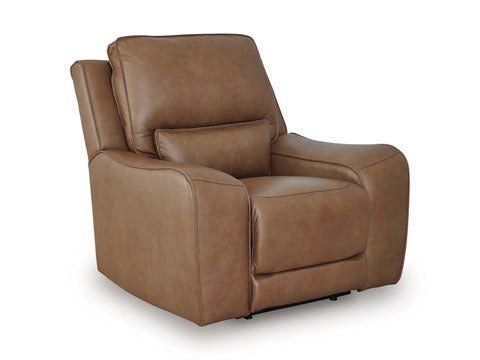 The Ashley DeepWakes Caramel Recliner U6260613, crafted from top-grain leather with plush cushions and curved armrests, is displayed on a white background.