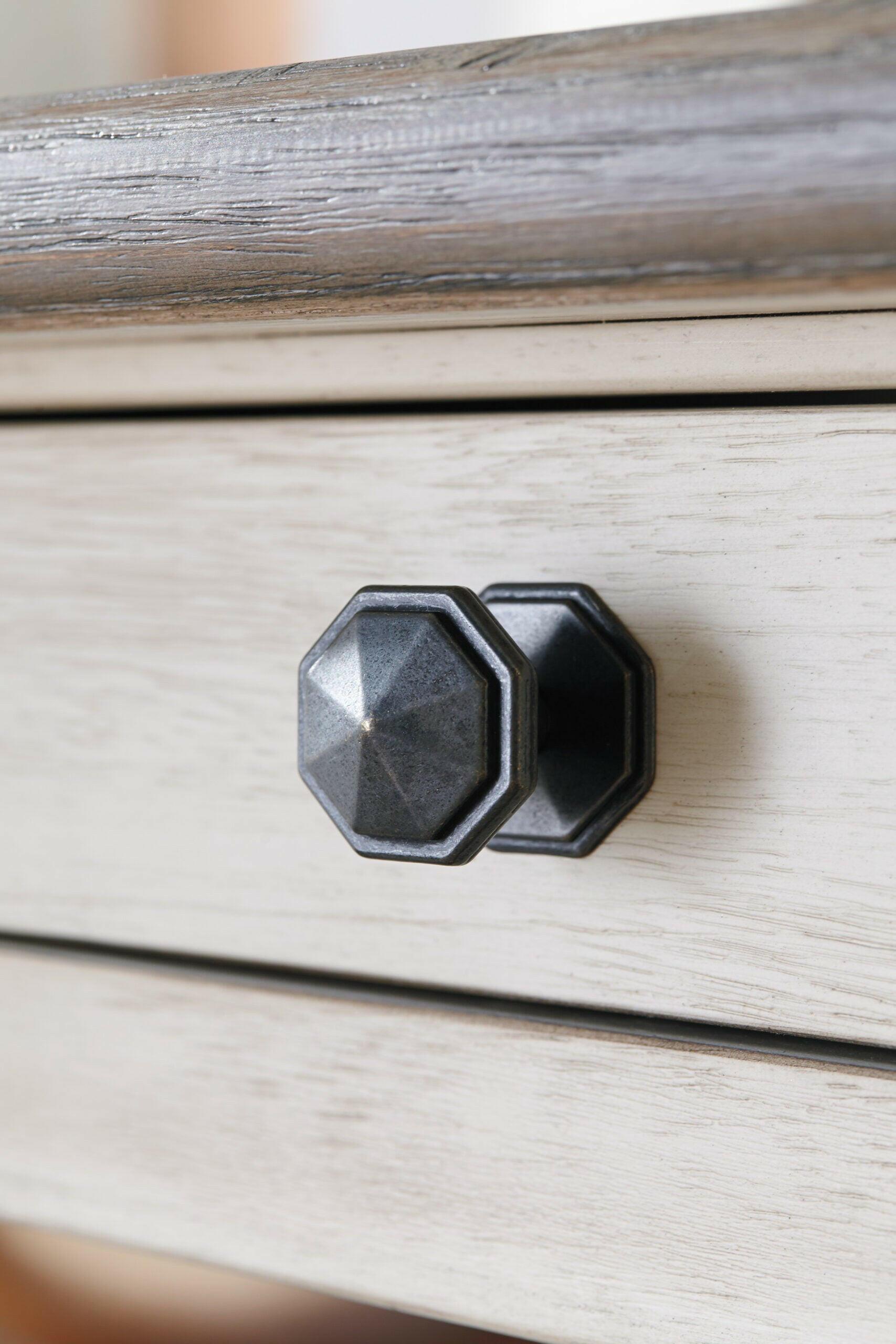 Bolanburg Table & 4 Chairs D647-124/32.