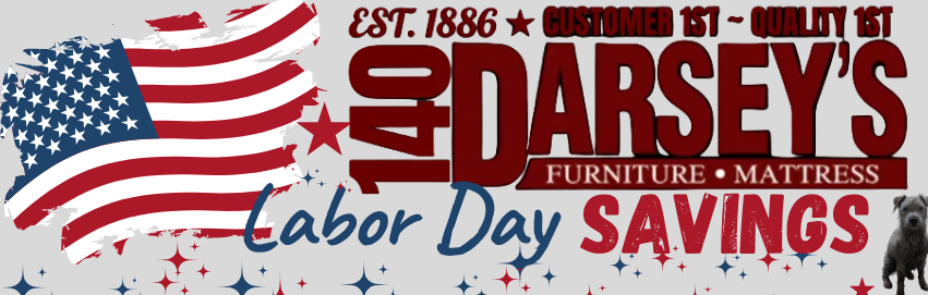 A promotional banner for 'Darsey's Furniture & Mattress' featuring a large waving American flag on the left, red and blue text reading 'Labor Day SAVINGS', and patriotic star accents on a light gray background.