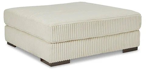 Lindyn Ivory Ottoman 2110408 - Darseys Furniture & MattressAshley