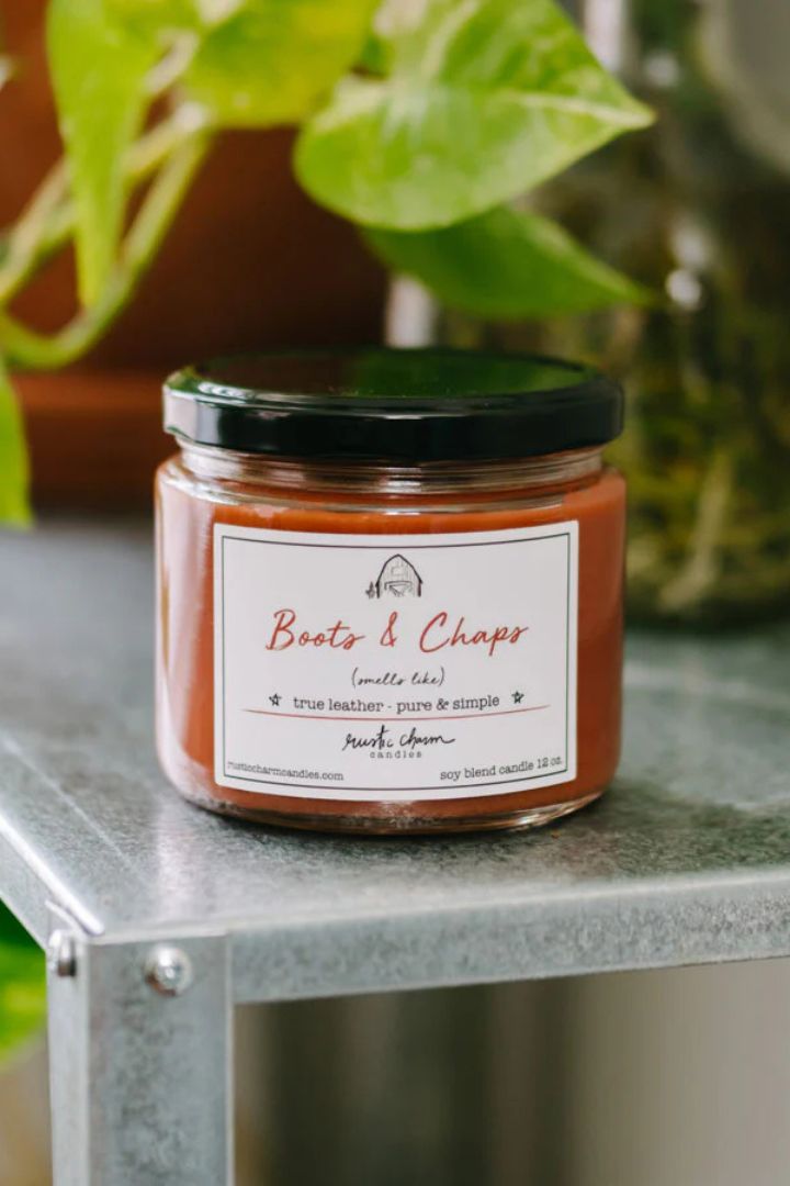 Rustic Charm Boots and Chaps 12 Oz Candle - Darseys Furniture & Mattress