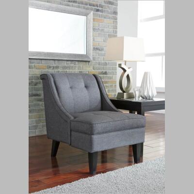 The Calion accent chair pictured in a room, with its linen-weave upholstery complements so many color schemes.