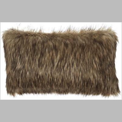 The Jinni accent pillow is covered in a luxurious caramel brown faux fur.