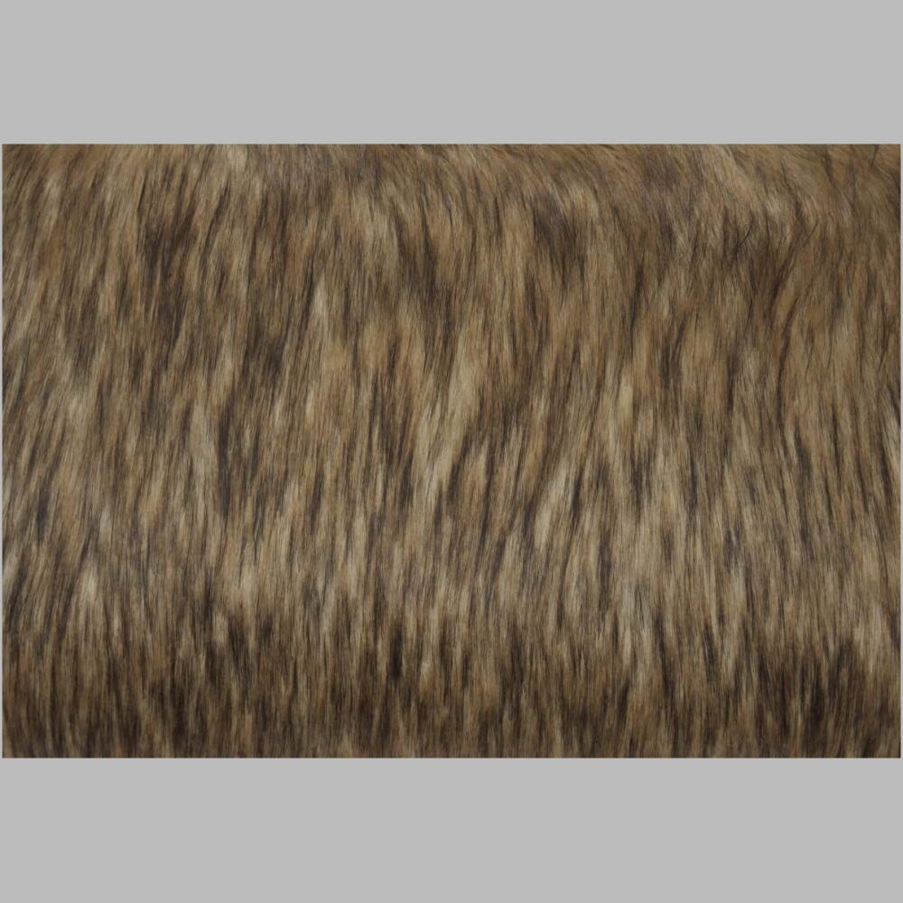 picture showing details of the faux fur of the jinni accent pillow is covered in a luxurious caramel brown faux fur.